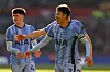 Tottenham Hotspur captain Son Heung-min, right, celebrates during the Premier League match against Brentford at the Gtech Community Stadium in London on Feb. 2. [REUTERS/YONHAP]