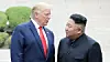 U.S. President Donald Trump, left, and North Korean leader Kim Jong-un cross into the South after greeting each other at the inter-Korean border village of Panmunjom on June 30, 2019. [YONHAP]