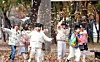 Children play among autumn leaves at a park in Buk District, Gwangju, on Nov. 21, 2024. [GWANGJU'S BUK DISTRICT OFFICE]