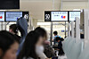 Koreans pass through a priority lane at Tokyo’s Haneda Airport, installed to mark the 60th anniversary of Korea-Japan diplomatic normalization, on June 1.[YONHAP]