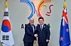 President Lee Jae Myung, right, and New Zealand's Prime Minister Christopher Luxon shake hands as they hold a bilateral summit in Gyeongju, North Gyeongsang, on Oct. 30. [JOINT PRESS CORPS]
