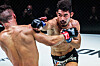 Korea's Ok Rae-yoon, right, takes on Lowen Tynanes in May 2023. [ONE CHAMPIONSHIP]