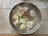 A mandu (dumpling) soup with rice cake at Gaetmaeul [JIN EUN-SOO]