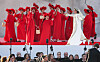 Opera performers in red and white costumes on an outdoor stage at St Petersburg’s Peter and Paul Fortress.