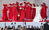 Opera performers in red and white costumes on an outdoor stage at St Petersburg’s Peter and Paul Fortress.